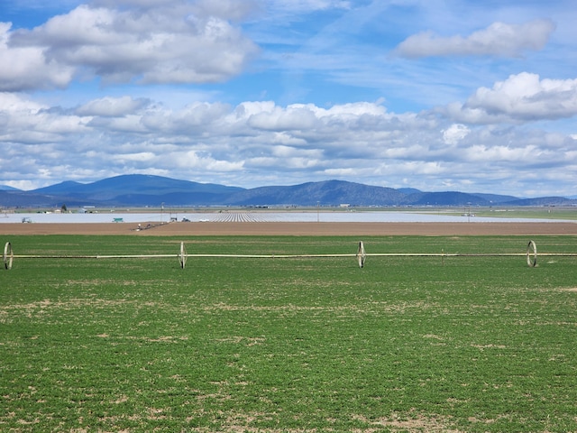 property view of mountains featuring a water view