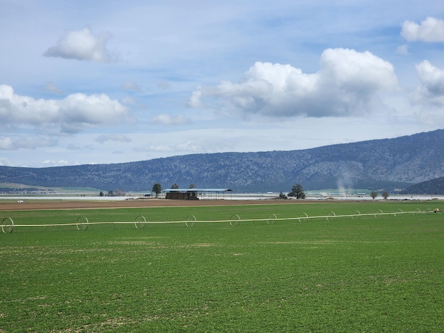 view of mountain feature with a rural view