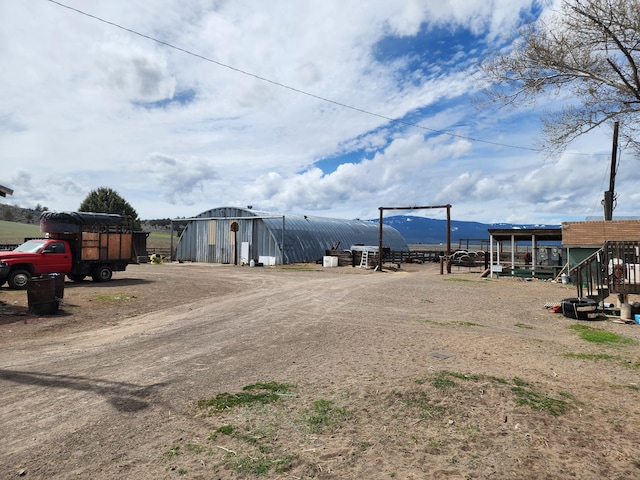 exterior space featuring an outbuilding
