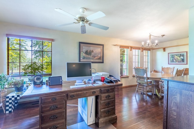 office area with baseboards, a healthy amount of sunlight, ceiling fan with notable chandelier, and wood finished floors