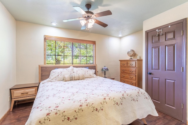 bedroom with recessed lighting, ceiling fan, and dark wood-style floors
