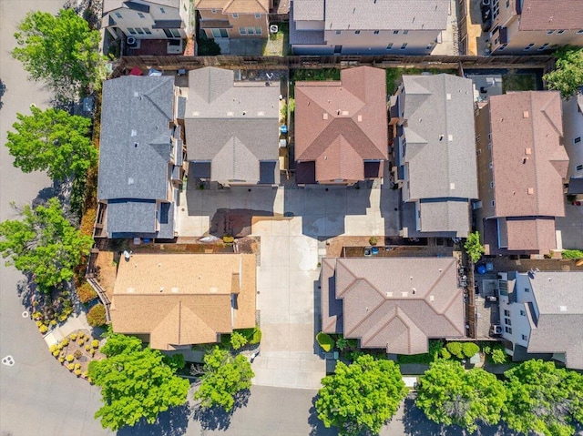 birds eye view of property with a residential view