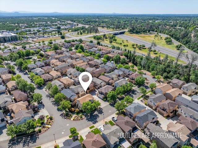 drone / aerial view with a residential view