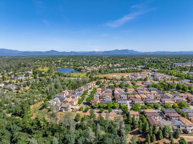 aerial view with a residential view and a water and mountain view