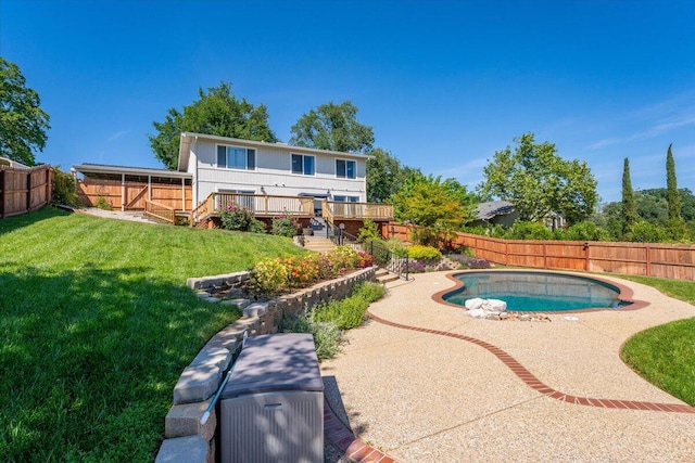 view of pool with stairs, a fenced backyard, a wooden deck, and a fenced in pool