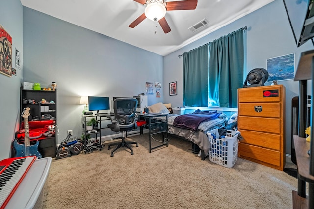 bedroom featuring carpet floors, a ceiling fan, and visible vents