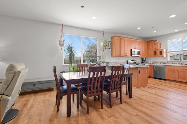 dining area with recessed lighting and light wood-type flooring