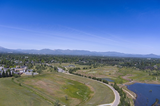 bird's eye view with a water and mountain view