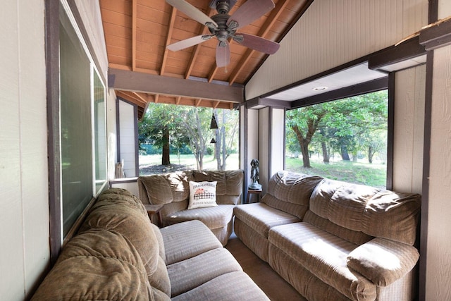 sunroom with wooden ceiling, lofted ceiling with beams, a ceiling fan, and wood finished floors