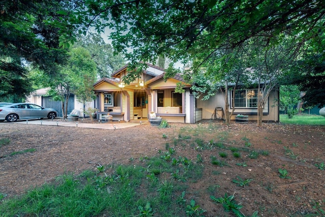 view of front of home featuring covered porch