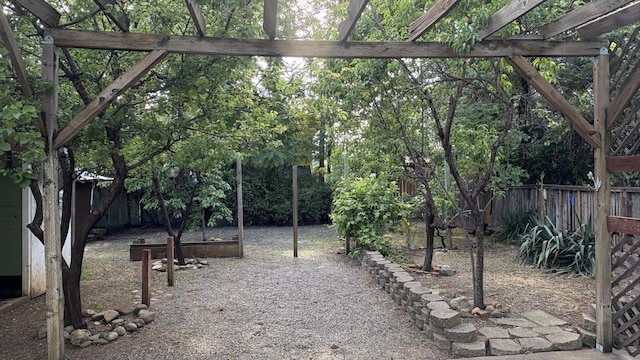 view of yard featuring fence