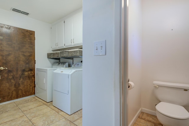 3140 Winding Way, Redding, CA 96003 - washroom with visible vents, laundry area, light tile patterned flooring, and washer and clothes dryer