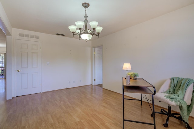 3140 Winding Way, Redding, CA 96003 - interior space featuring baseboards, visible vents, an inviting chandelier, and light wood finished floors