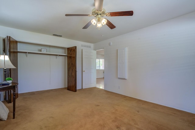 3140 Winding Way, Redding, CA 96003 - unfurnished bedroom featuring ceiling fan, light carpet, a closet, and visible vents