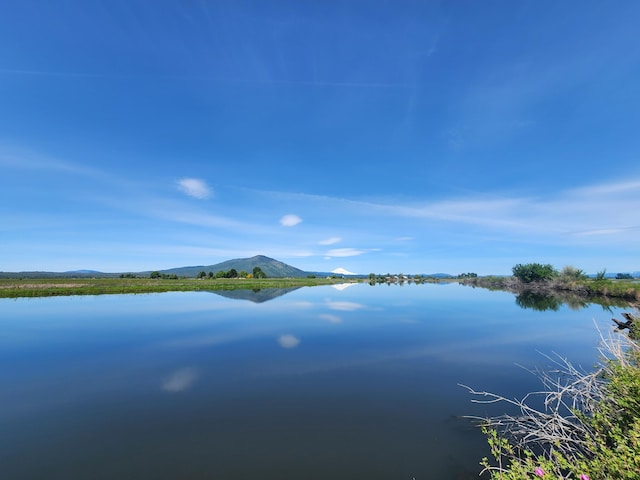 25653 Glenburn Rd, Fall River Mills, CA 96028 - water view with a mountain backdrop