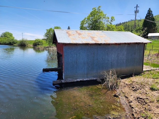 25653 Glenburn Rd, Fall River Mills, CA 96028 - view of outbuilding featuring a water view and an outbuilding
