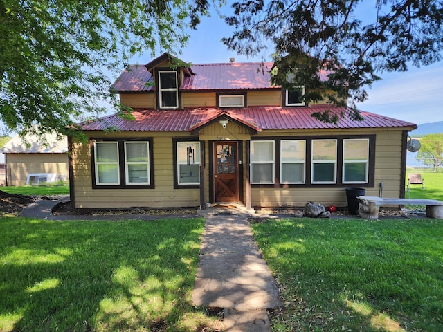 25653 Glenburn Rd, Fall River Mills, CA 96028 - view of front of house with a front lawn and metal roof