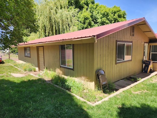 25653 Glenburn Rd, Fall River Mills, CA 96028 - view of home's exterior featuring a yard and metal roof