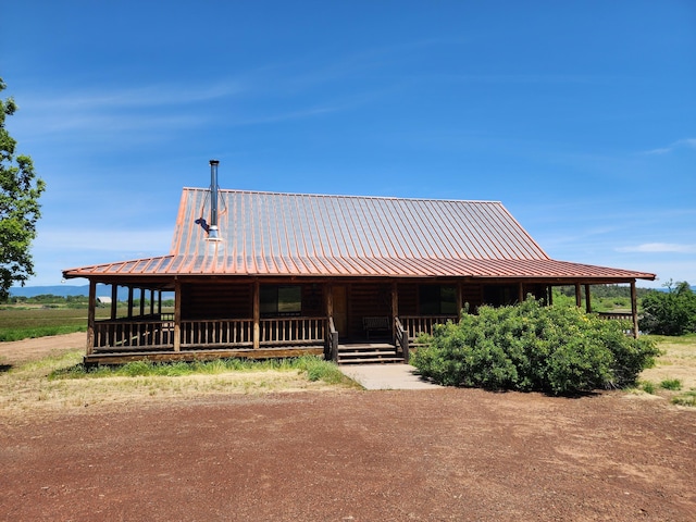 25653 Glenburn Rd, Fall River Mills, CA 96028 - view of front of property with covered porch and metal roof