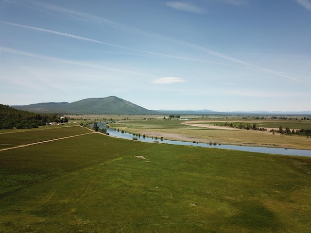 25653 Glenburn Rd, Fall River Mills, CA 96028 - mountain view with a nearby body of water and rural landscape