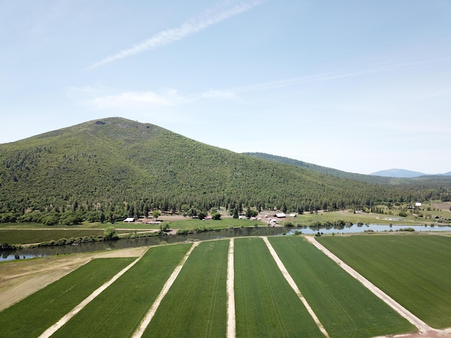 25653 Glenburn Rd, Fall River Mills, CA 96028 - view of mountain backdrop with a nearby body of water