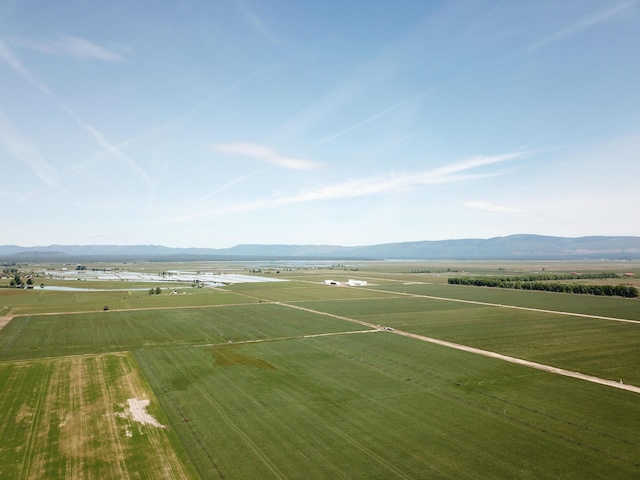 25653 Glenburn Rd, Fall River Mills, CA 96028 - overview of rural landscape featuring a mountainous background and rows of crops