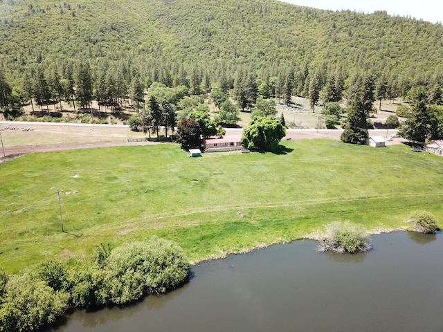 25653 Glenburn Rd, Fall River Mills, CA 96028 - aerial view of a heavily wooded area and a nearby body of water