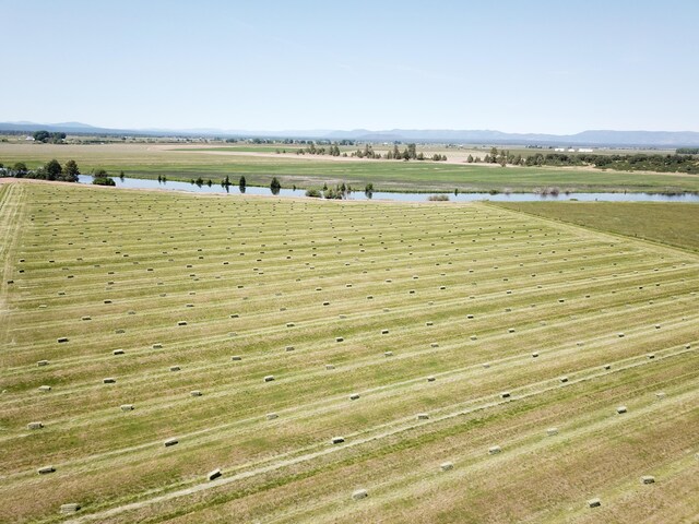 25653 Glenburn Rd, Fall River Mills, CA 96028 - drone / aerial view of a water and mountain view