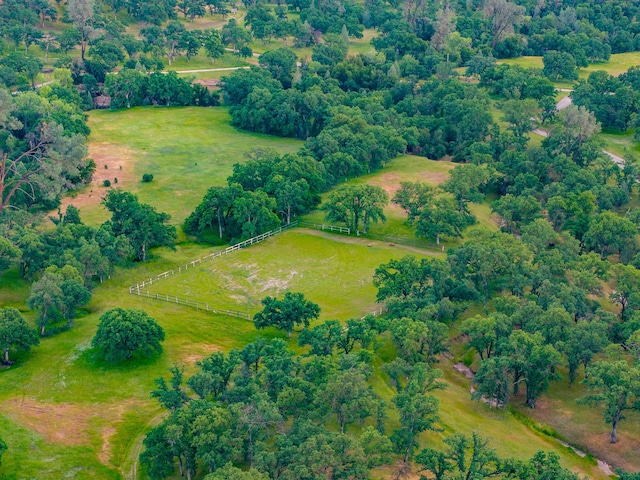 birds eye view of property featuring a rural view