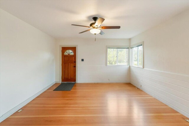 979 Lassen Ln, Mount Shasta, CA 96067 - interior space with ceiling fan, wainscoting, and light wood-type flooring