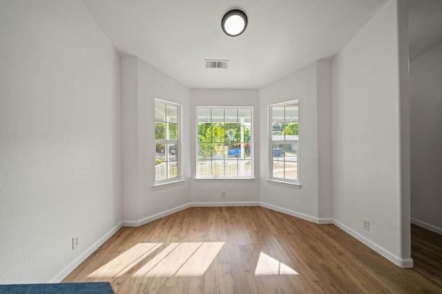 14556 Ryan Ln, Red Bluff, CA 96080 - spare room with visible vents, baseboards, and wood finished floors