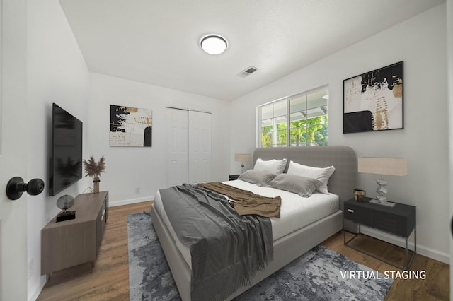 14556 Ryan Ln, Red Bluff, CA 96080 - bedroom featuring visible vents, baseboards, and wood finished floors
