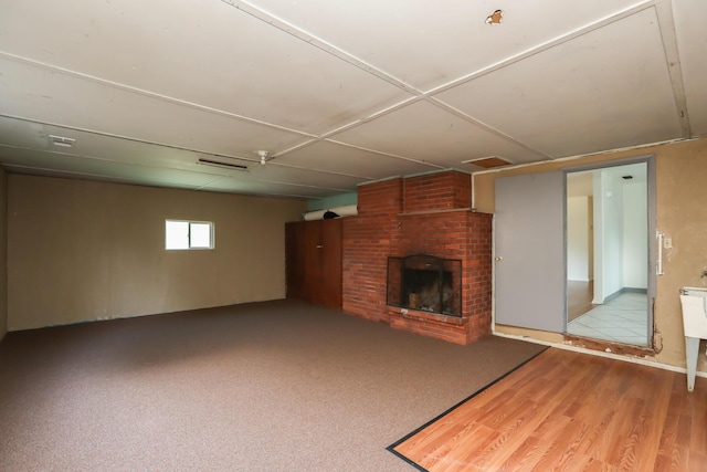 unfurnished living room with a fireplace