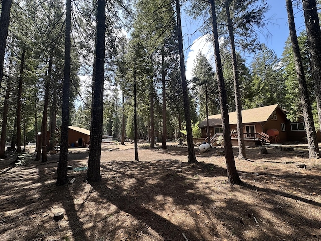 view of yard featuring a deck
