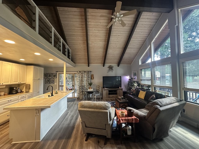 living room featuring a ceiling fan, dark wood-style flooring, beam ceiling, wooden ceiling, and recessed lighting