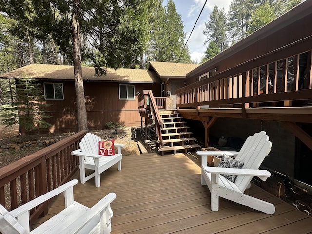 deck featuring stairs