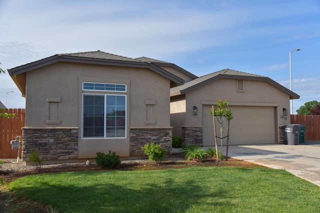 2876 Calaveras Ct, Redding, CA 96002 - ranch-style home featuring stone siding, stucco siding, and concrete driveway