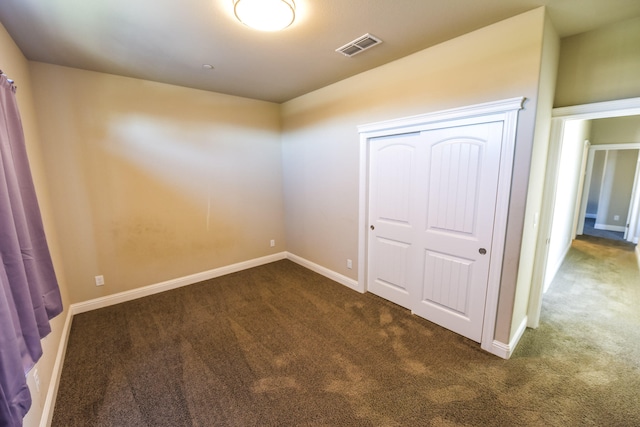 2876 Calaveras Ct, Redding, CA 96002 - unfurnished bedroom featuring carpet flooring, baseboards, and a closet