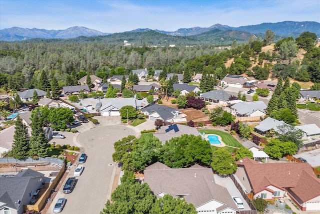 4217 Pendleton Ct, Shasta Lake, CA 96019 - aerial perspective of suburban area with a mountainous background and a forest