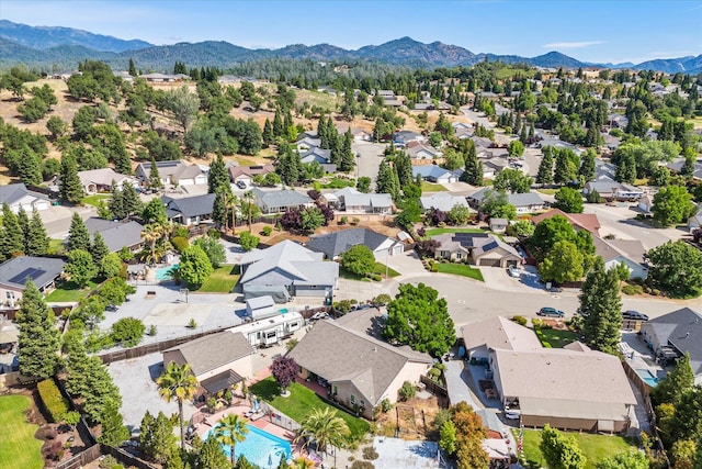 4217 Pendleton Ct, Shasta Lake, CA 96019 - aerial view of residential area with a mountainous background