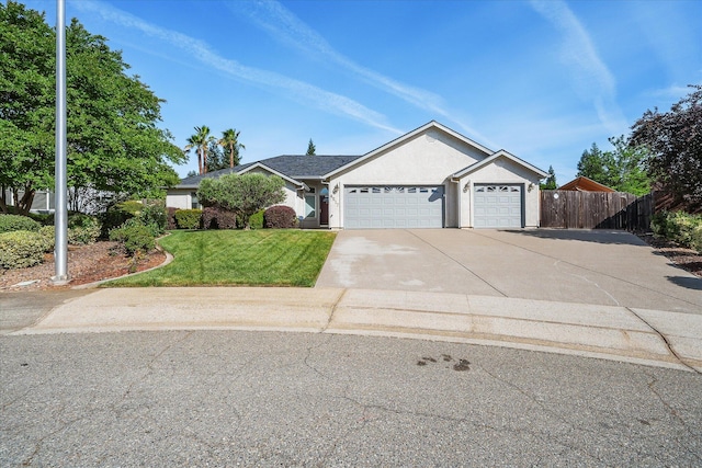 4217 Pendleton Ct, Shasta Lake, CA 96019 - ranch-style house with an attached garage, driveway, and stucco siding