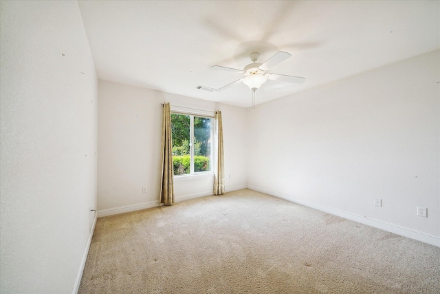 4217 Pendleton Ct, Shasta Lake, CA 96019 - unfurnished room with light carpet, baseboards, and a ceiling fan