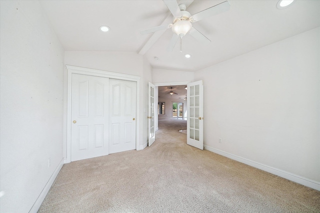 4217 Pendleton Ct, Shasta Lake, CA 96019 - unfurnished bedroom with french doors, light colored carpet, lofted ceiling, baseboards, and a closet