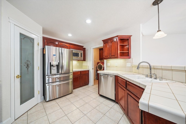 4217 Pendleton Ct, Shasta Lake, CA 96019 - kitchen featuring appliances with stainless steel finishes, tile countertops, backsplash, open shelves, and recessed lighting