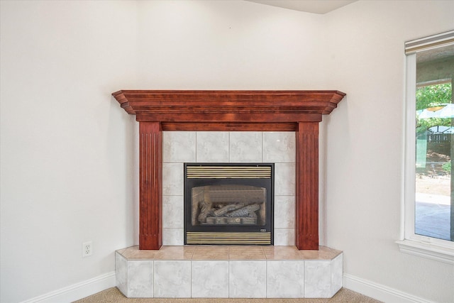 4217 Pendleton Ct, Shasta Lake, CA 96019 - detailed view of baseboards and a tiled fireplace