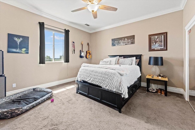 carpeted bedroom featuring crown molding, visible vents, baseboards, and a ceiling fan