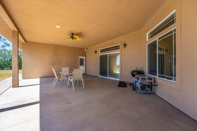 view of patio / terrace featuring ceiling fan and outdoor dining space