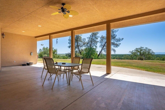 view of patio / terrace featuring ceiling fan and outdoor dining space