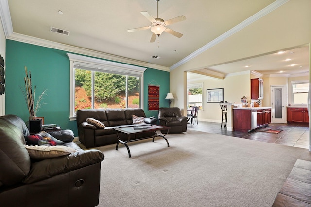 3776 Mario Ave, Redding, CA 96001 - living area featuring crown molding, plenty of natural light, visible vents, and ceiling fan