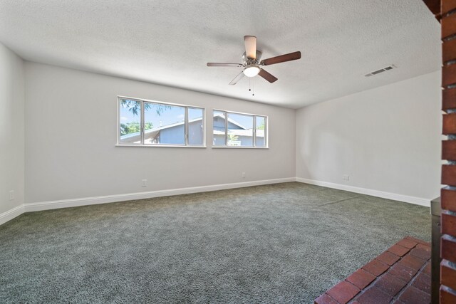 1530 Carmel Way, Red Bluff, CA 96080 - carpeted spare room with ceiling fan, a textured ceiling, and baseboards